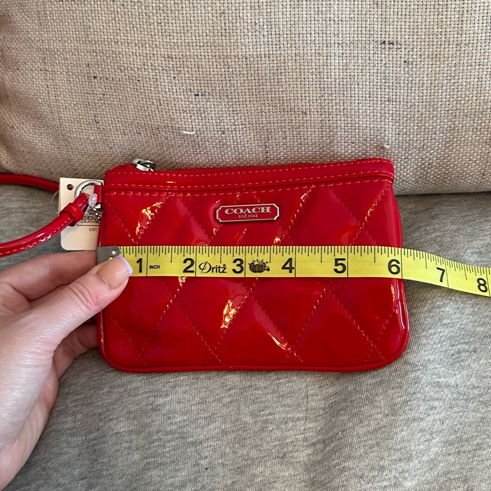 Coach cherry red liquid poppy legacy patent wristlet
